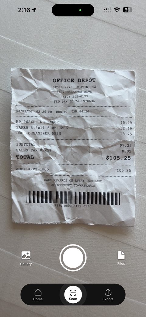 Taxr's camera scanning a crumpled Office Depot receipt